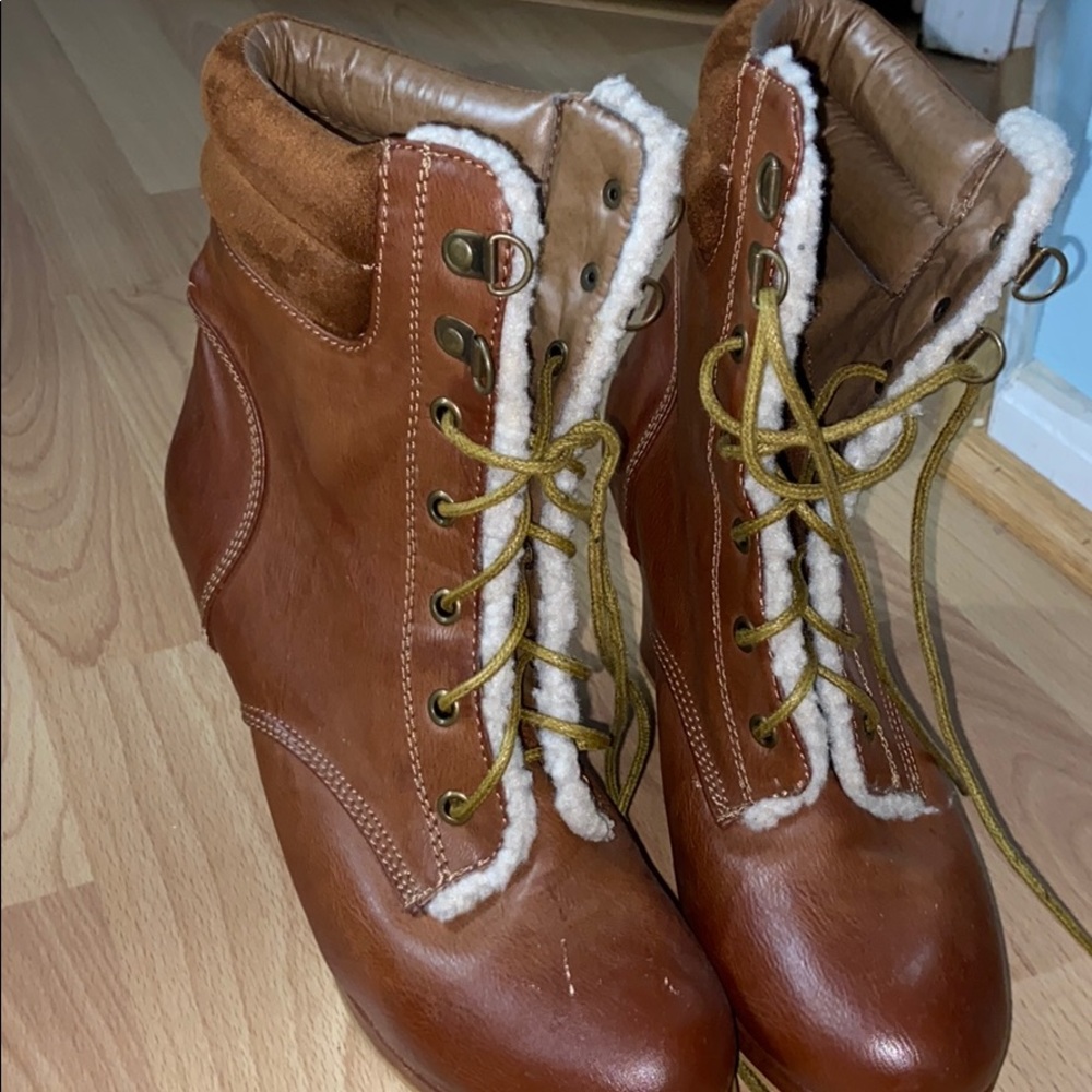 Brown leather and suede wedged boots